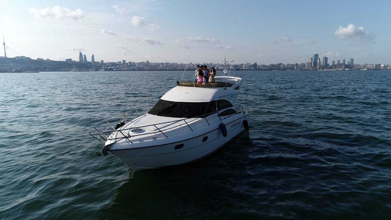 Luxury yacht sailing near Baku coastline